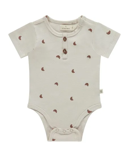 A Tiny Story Romper Croissant