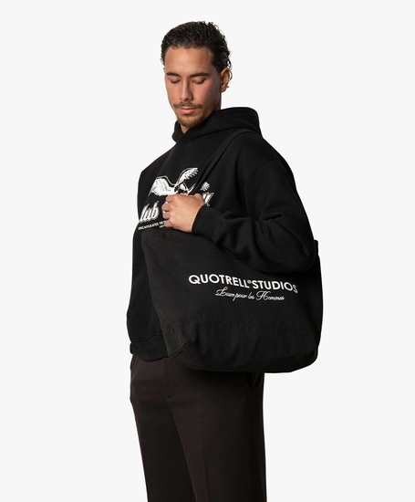Quotrell Tote Bag